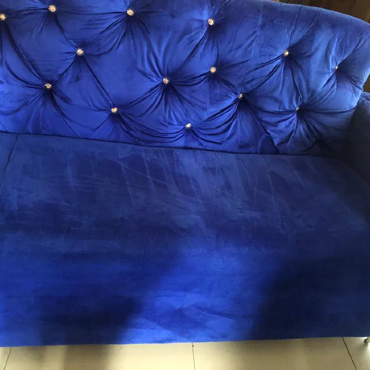 Tufted velvet sofa — after cleaning